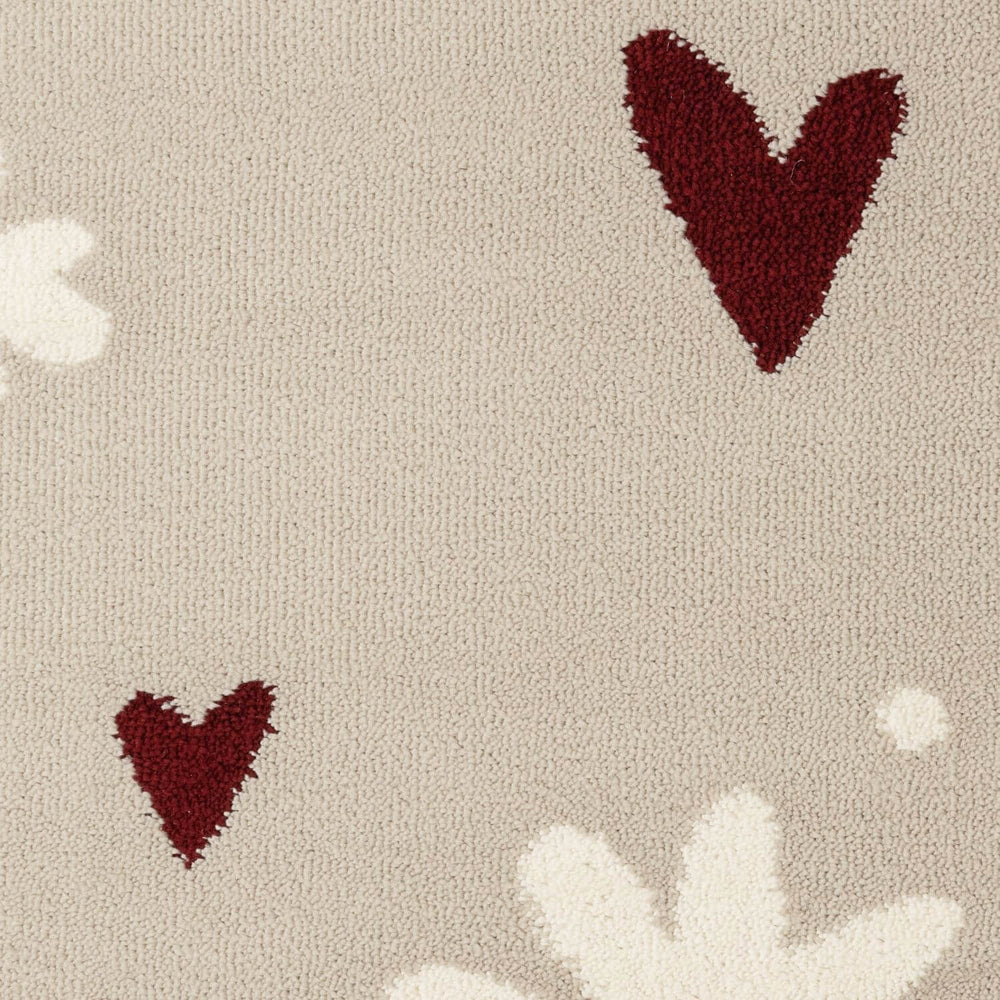 Pattern of red hearts and white flowers on a beige background
