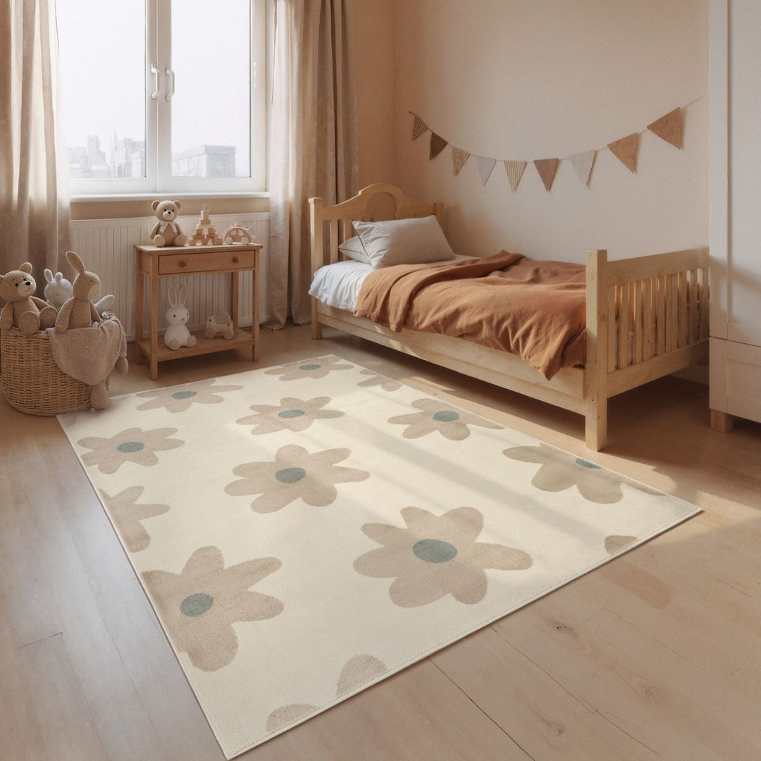 Children's bedroom with a floral rug, wooden bed, and toys.