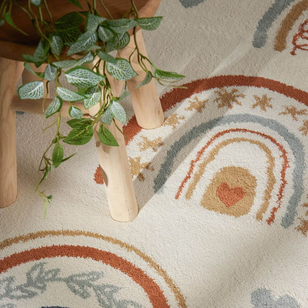 Close-up of a wooden stool with a plant on a colorful patterned rug