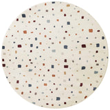 Round rug with a multicolored square pattern on a white background