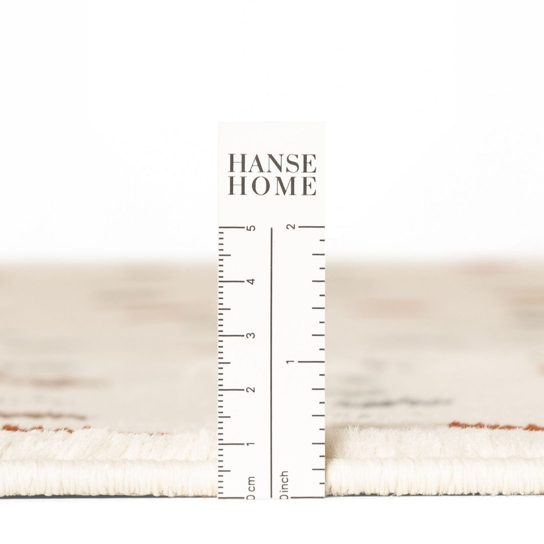 Textured fabric swatch with a ruler and 'HANSE HOME' branding.