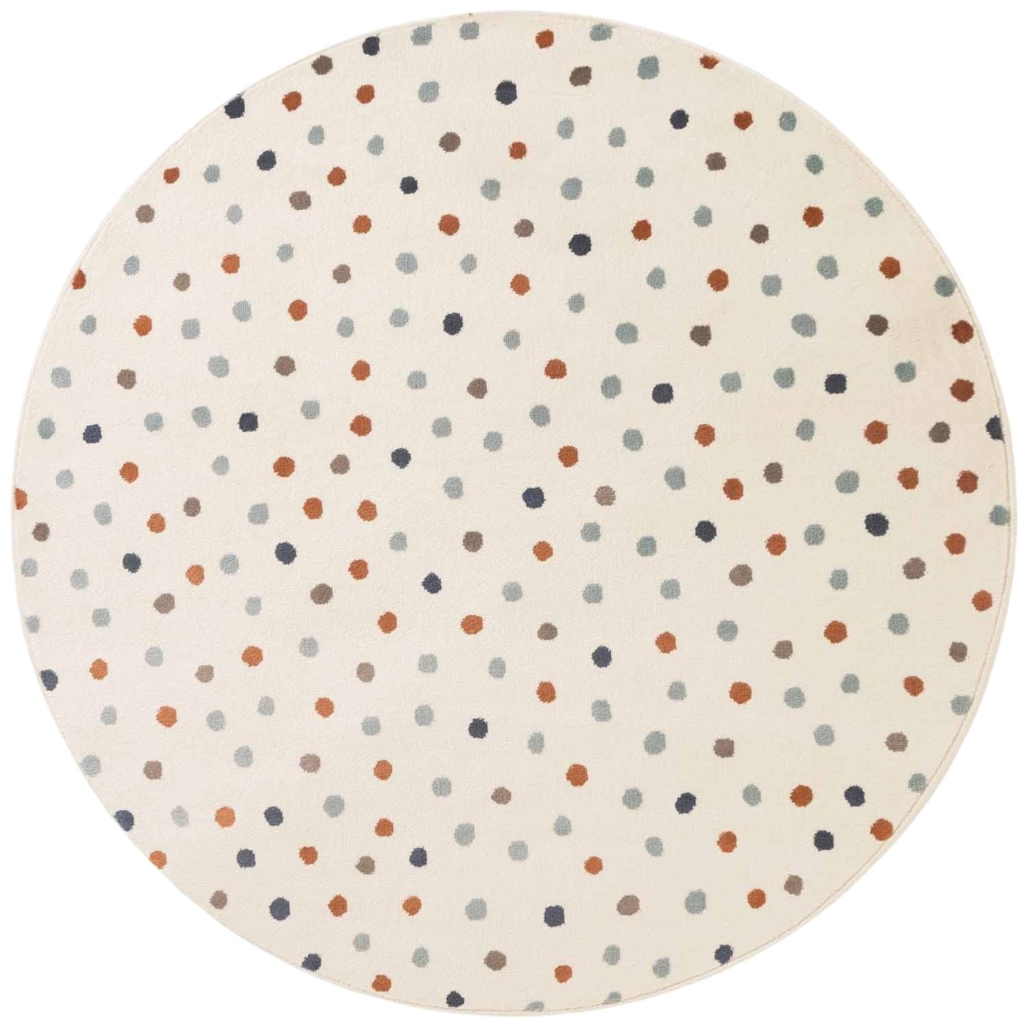 Round rug with multicolored dot pattern on a white background
