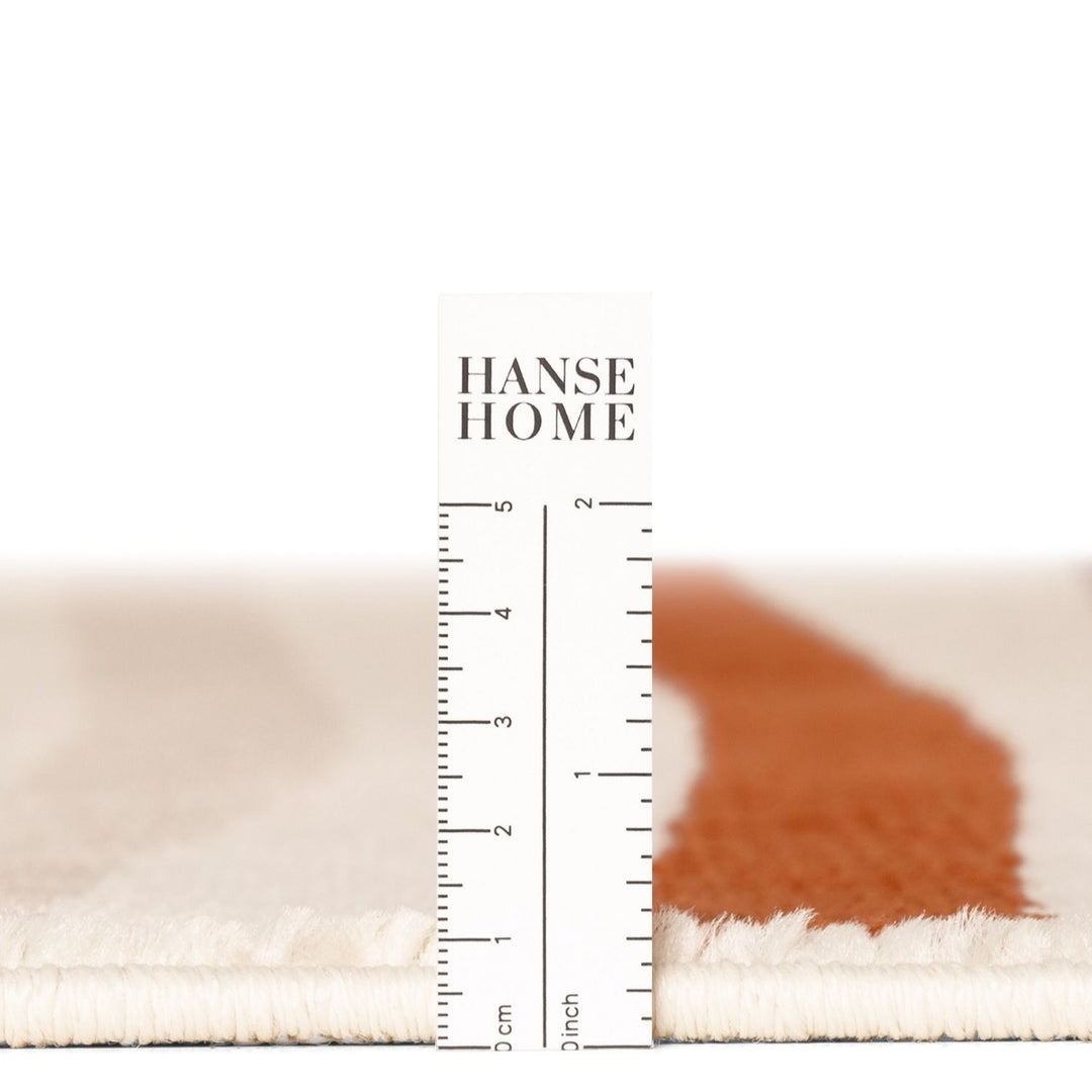 Hanse Home rug with a measurement scale showing dimensions.