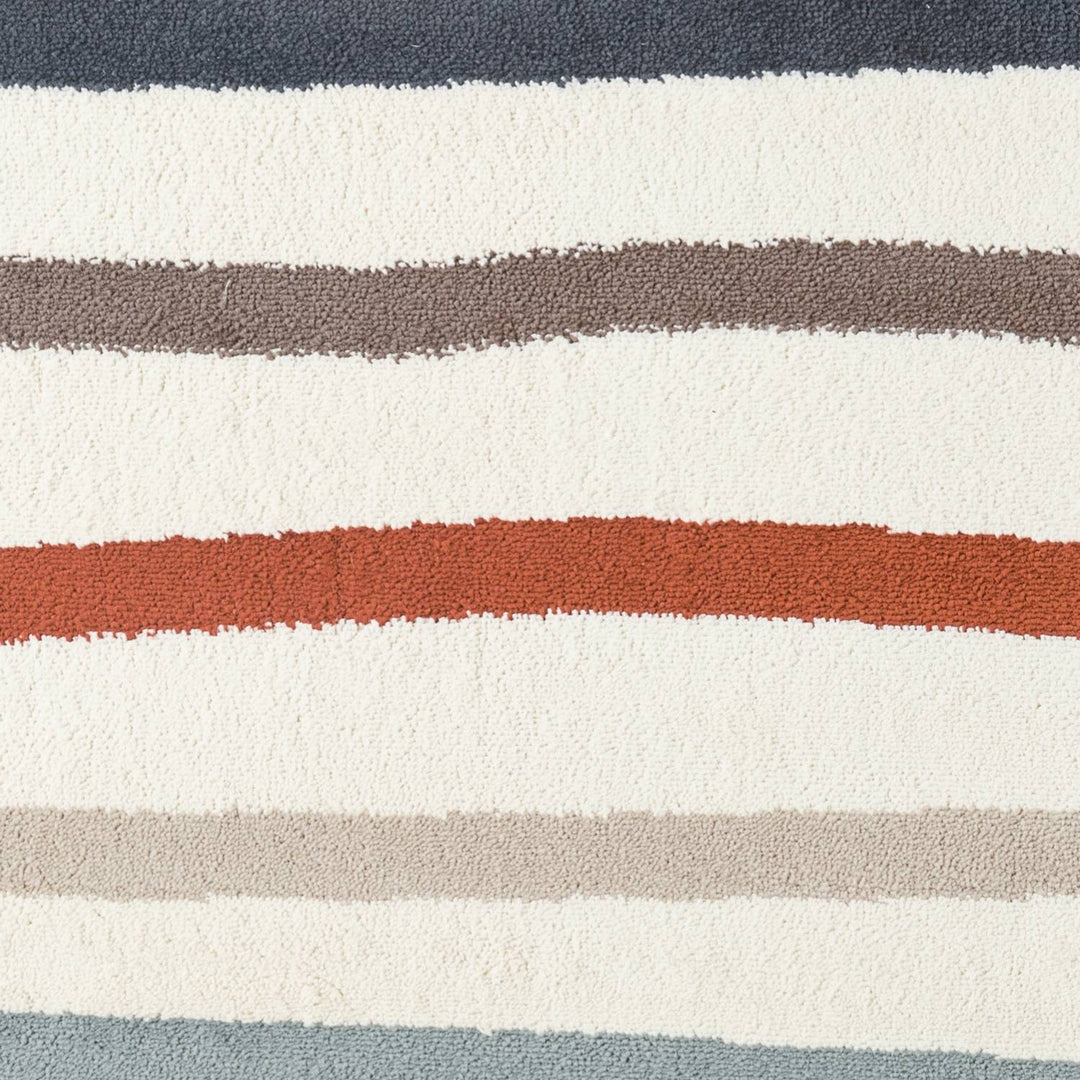 Close-up of a striped fabric with red, gray, and white colors.