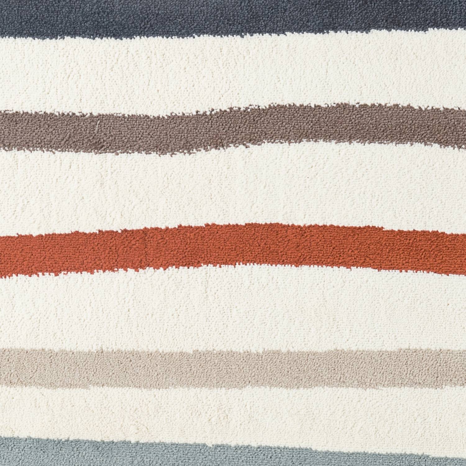 Close-up of a striped fabric with red, gray, and white colors.