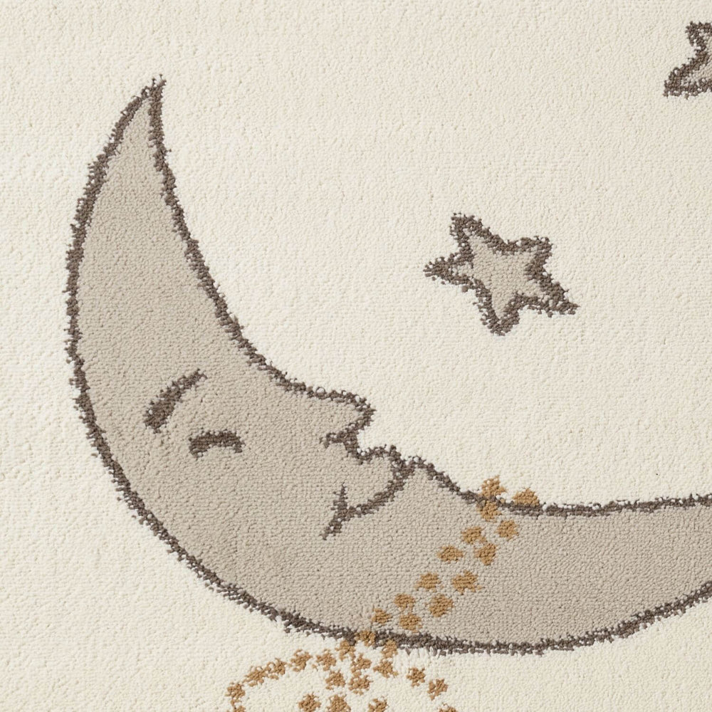 Decorative rug with a smiling moon and star design on a beige background
