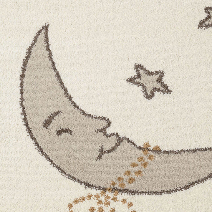 Decorative rug with a smiling moon and star design on a beige background