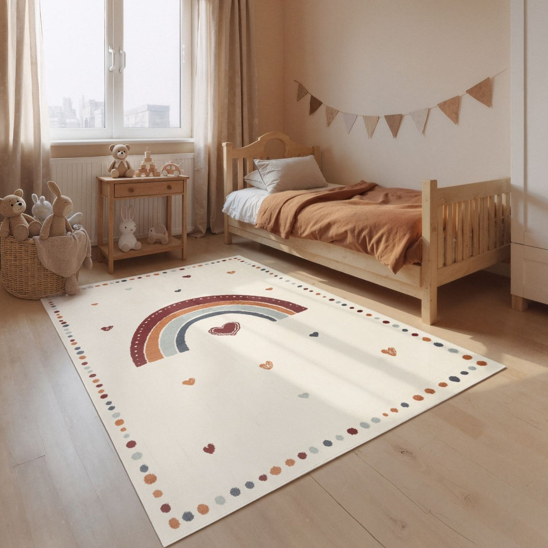 Children's bedroom with a rainbow rug on the floor