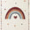 Children's rug with a rainbow and hearts design on a beige background