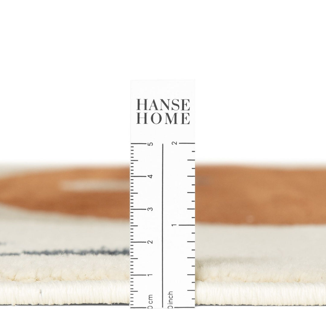 Textured fabric swatch with a ruler and 'HANSE HOME' branding on a white background