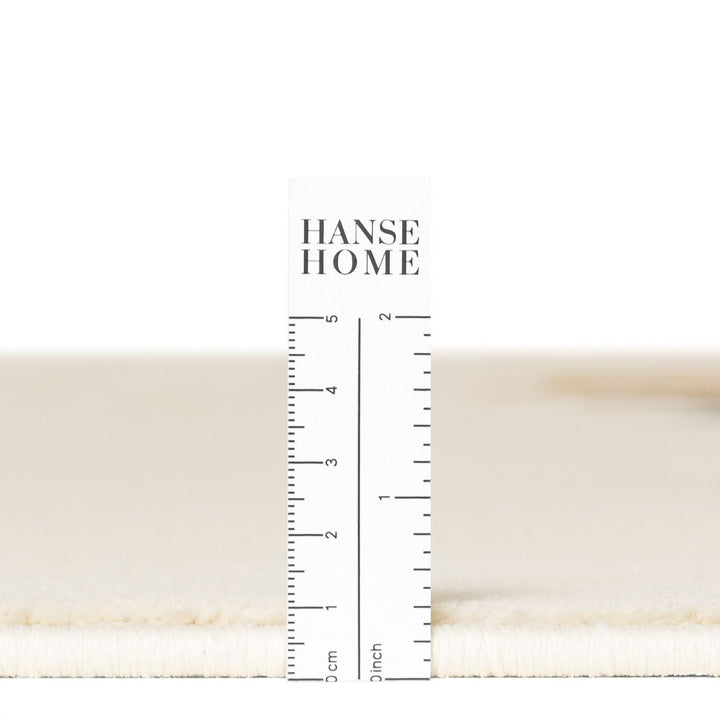 Measurement of fabric width with 'Hanse Home' branding