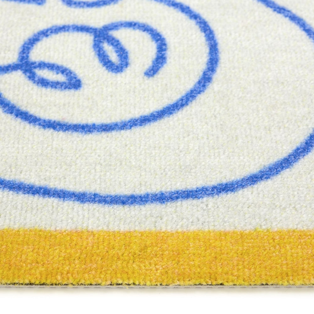 Close-up of a product with blue and yellow design on a white background