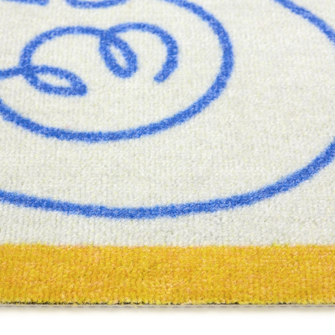 Close-up of a product with blue and yellow design on a white background