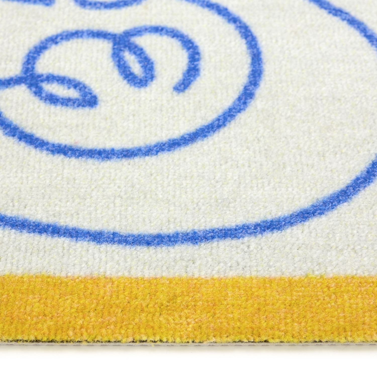 Close-up of a product with blue and yellow design on a white background