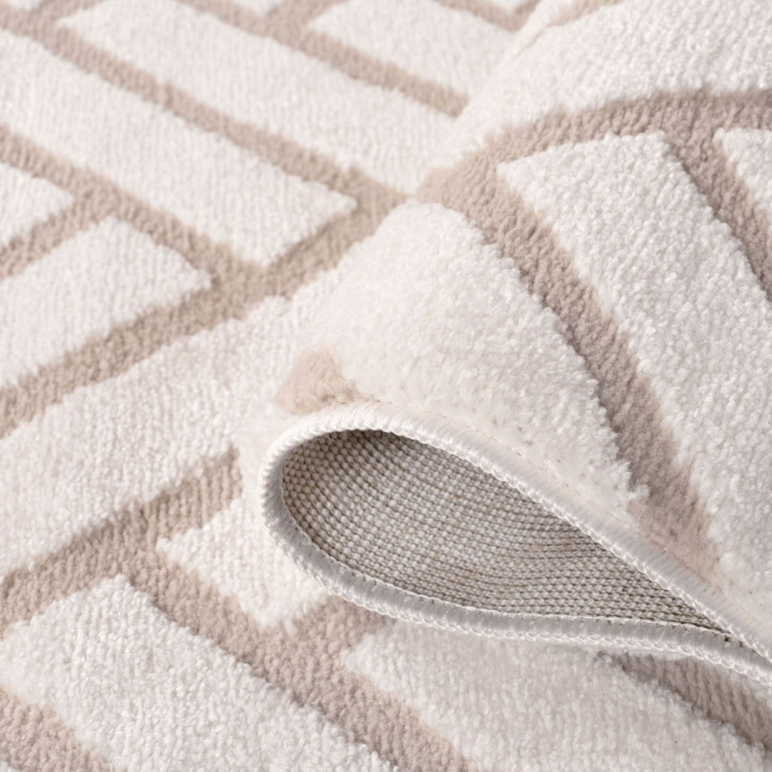 Close-up of a textured rug with geometric pattern