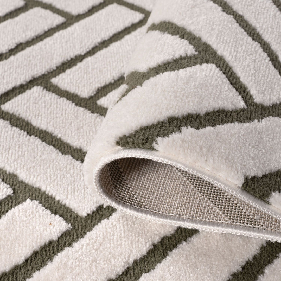 Close-up of a textured rug with geometric pattern