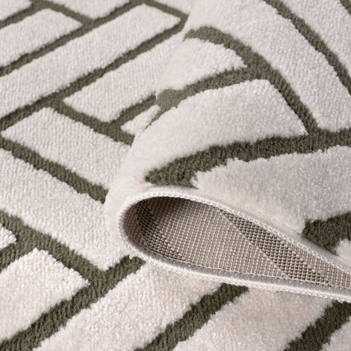 Close-up of a textured rug with geometric pattern