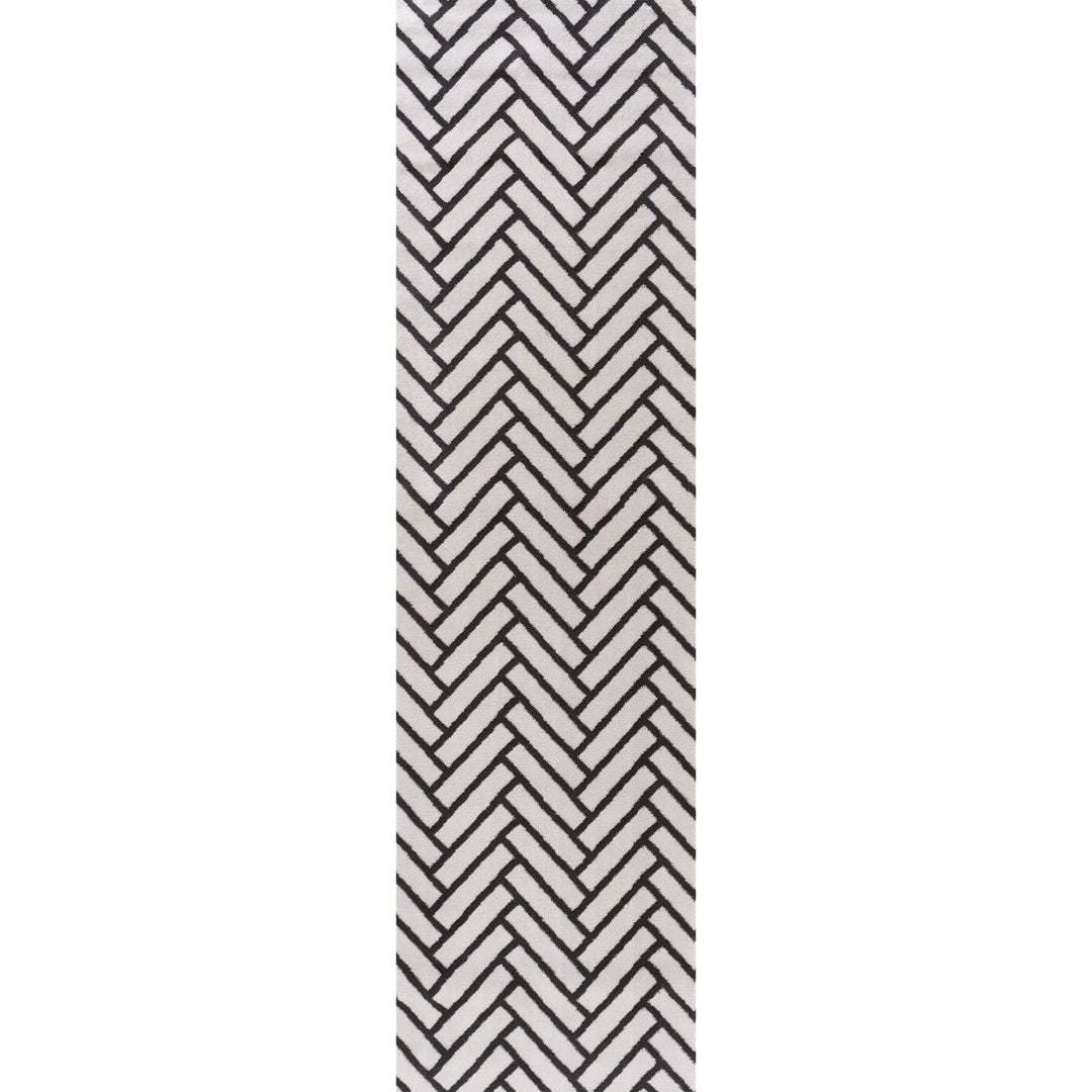 Black and white herringbone pattern on a white background