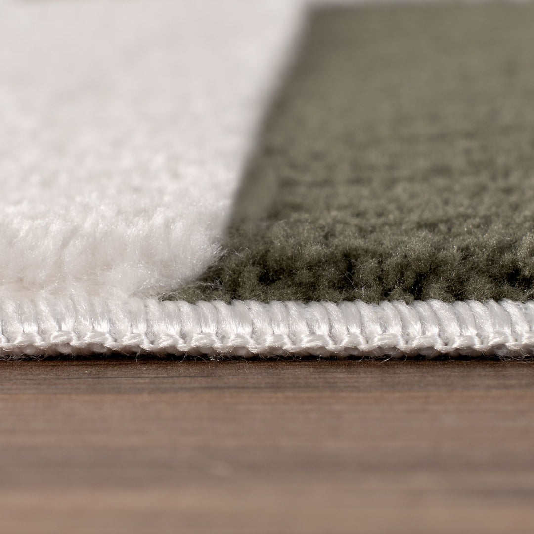 Loft Striped Green Rug Non-shedding, easy care.