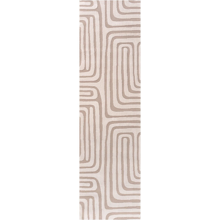 Rectangular area rug with a beige and brown wavy pattern on a white background