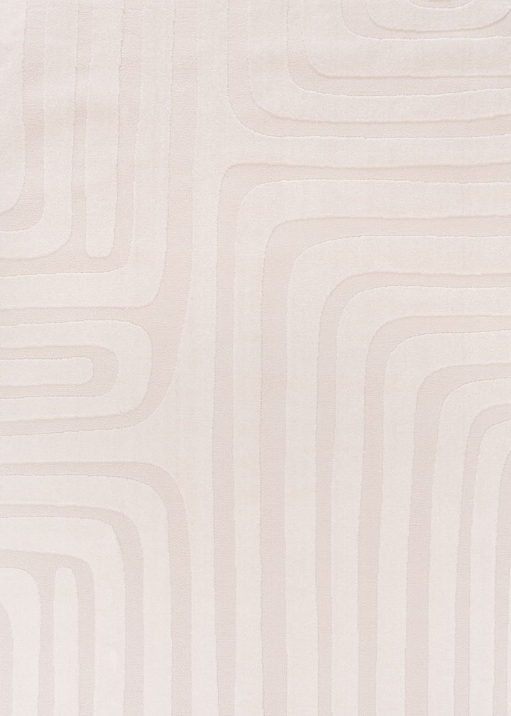 Close-up of a textured beige wall with wavy patterns