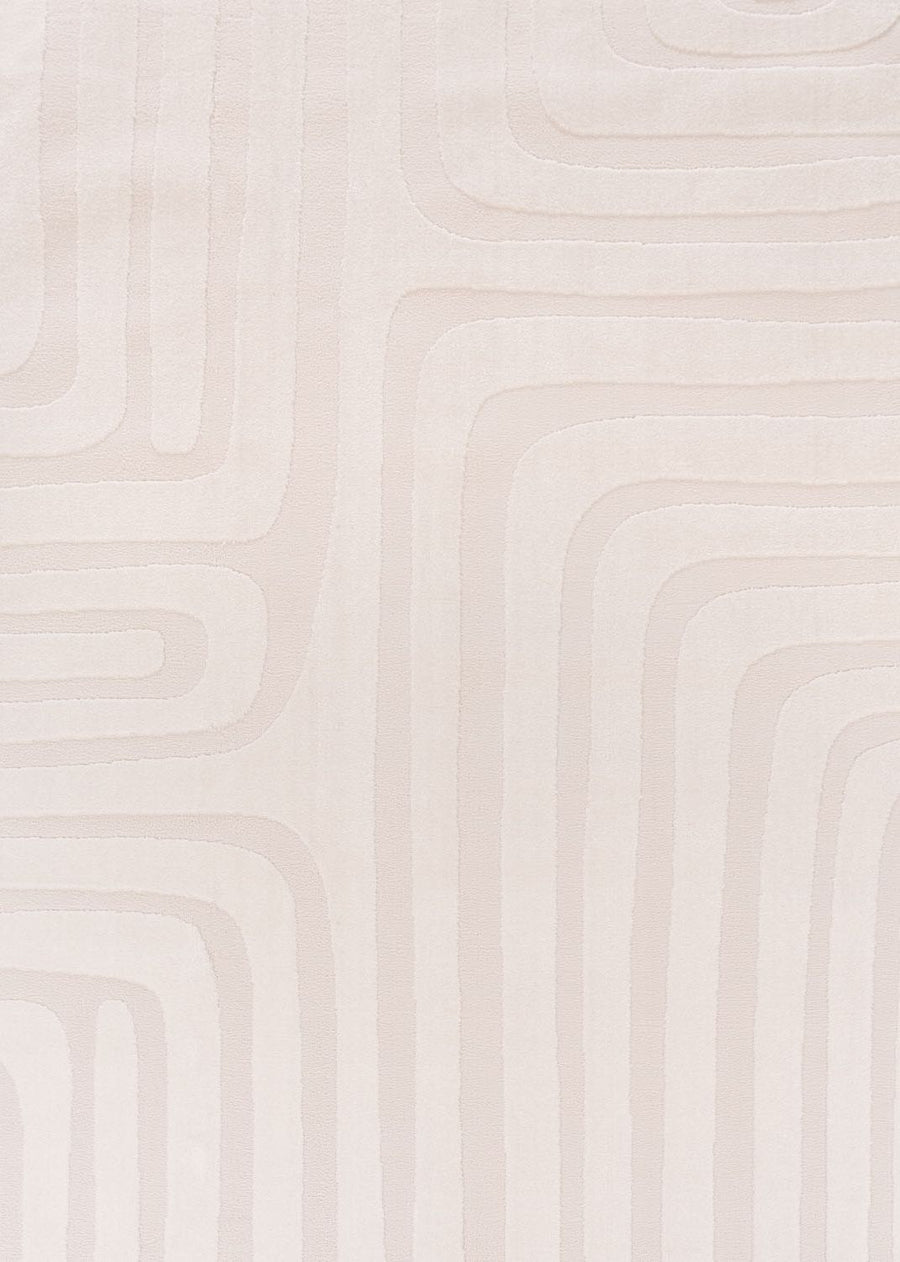 Close-up of a textured beige wall with wavy patterns