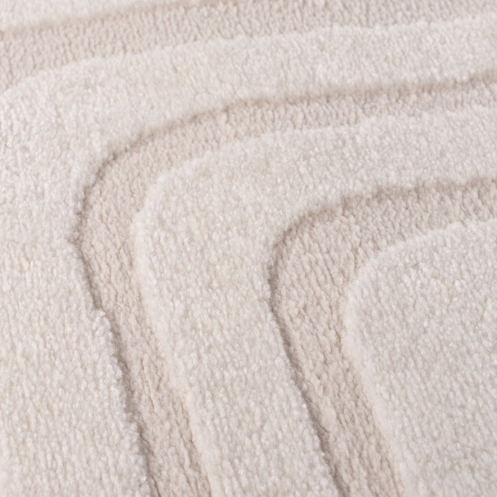 Close-up of beige fabric with a textured pattern