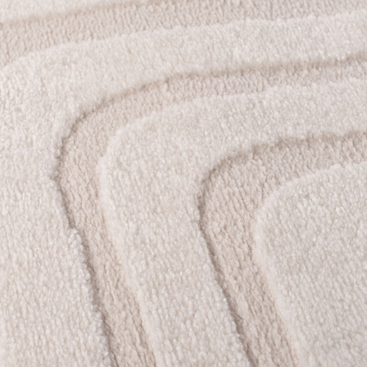 Close-up of beige fabric with a textured pattern