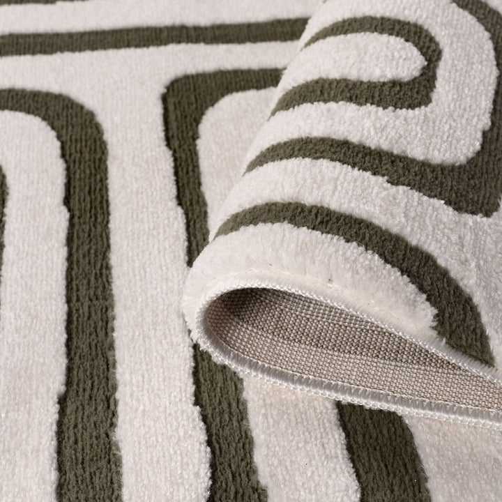 Close-up of a textured rug with geometric pattern