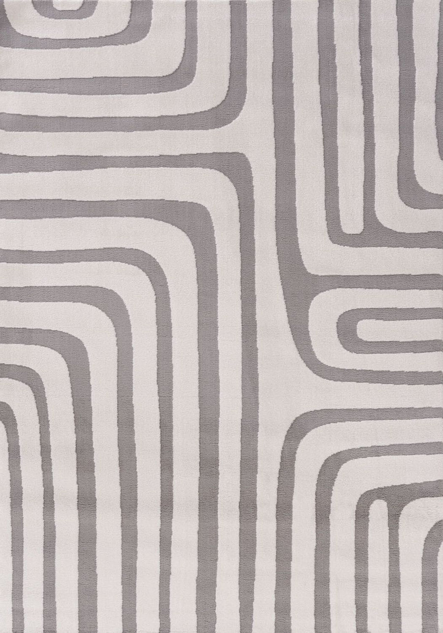 Patterned fabric with wavy lines in gray on a light gray background