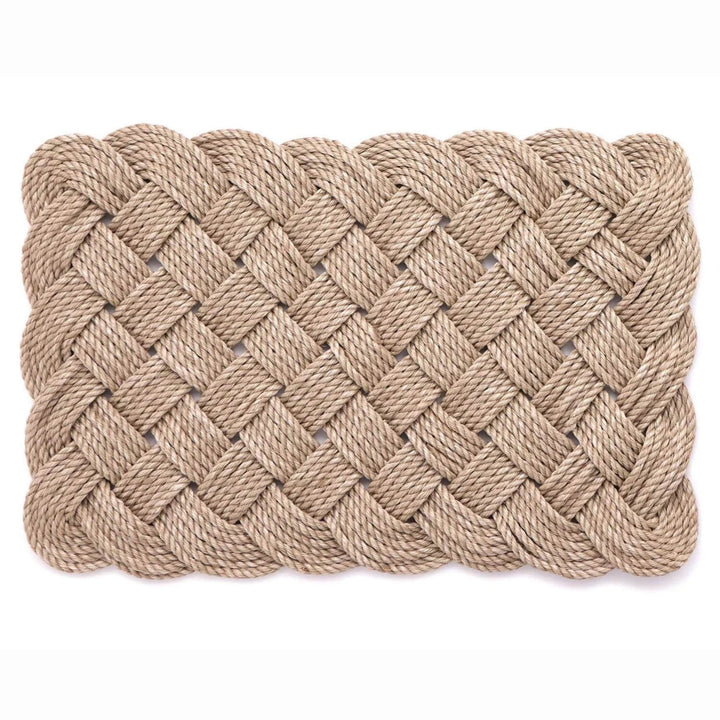 Woven rope mat on a white background