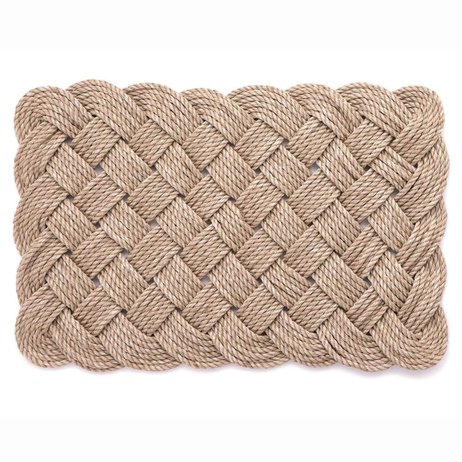 Woven rope mat on a white background