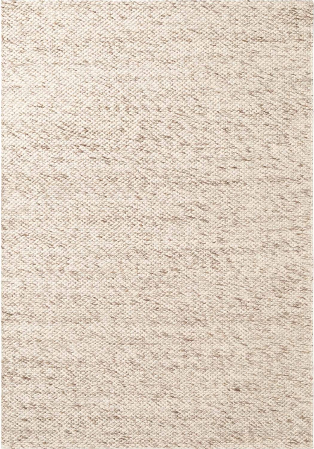 Beige textured rug with a subtle pattern