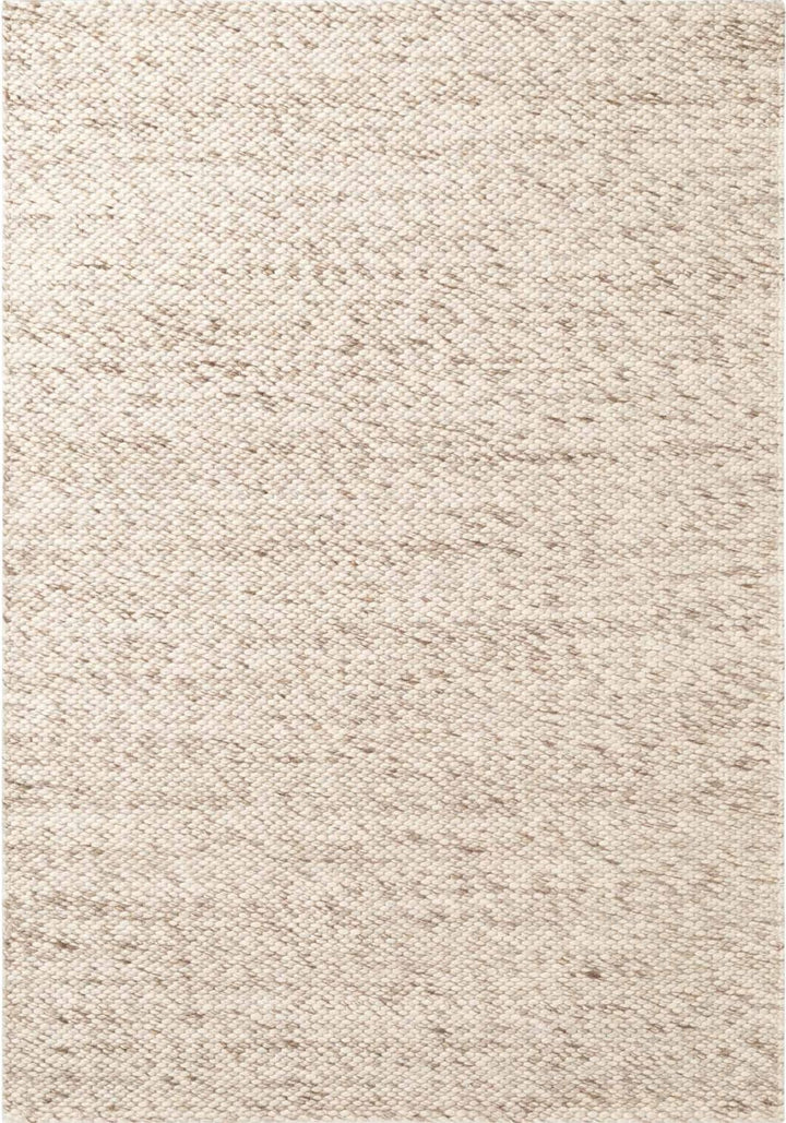 Beige textured rug with a subtle pattern