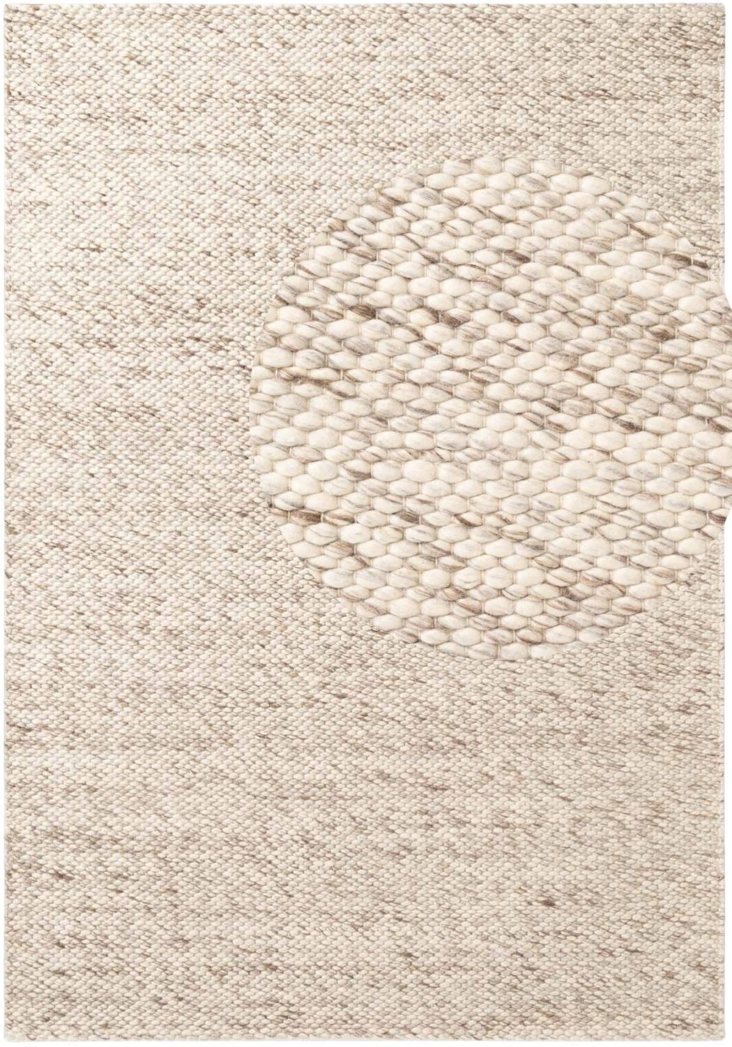 Beige textured rug with a subtle pattern