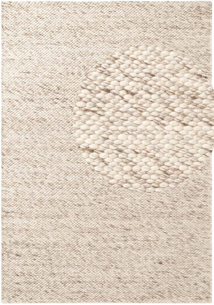 Beige textured rug with a subtle pattern