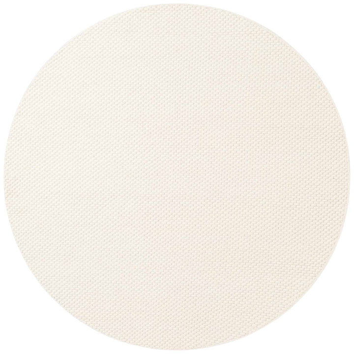 Round white rug on a white background