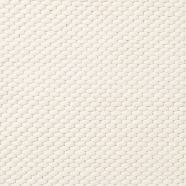 Close-up of a textured white fabric surface