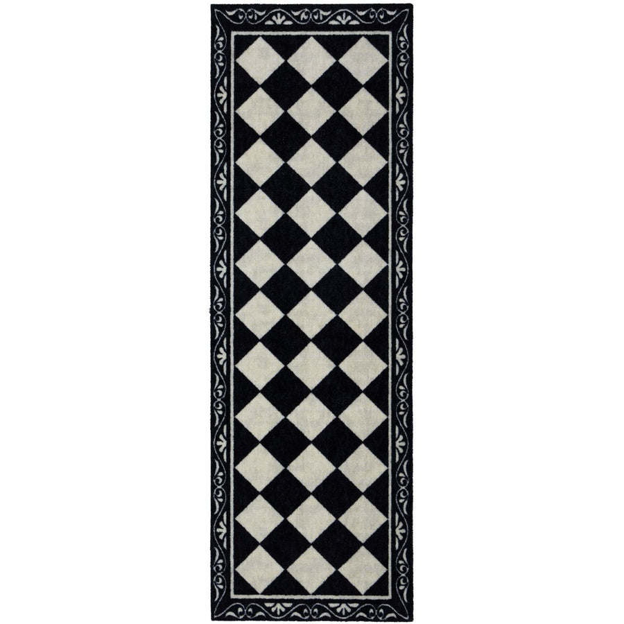 Black and white checkered rug with decorative border on a white background