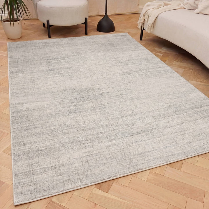 Cream and grey abstract patterned Montana rug, styled in a British living room