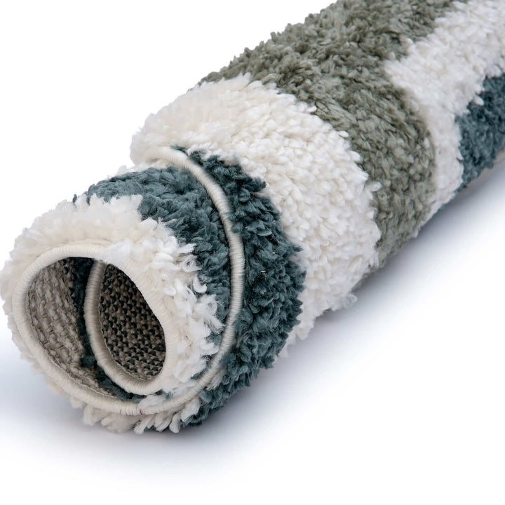 Moodi Shaggy Green Rug, Bordered design, underfloor heating | THE RUGS