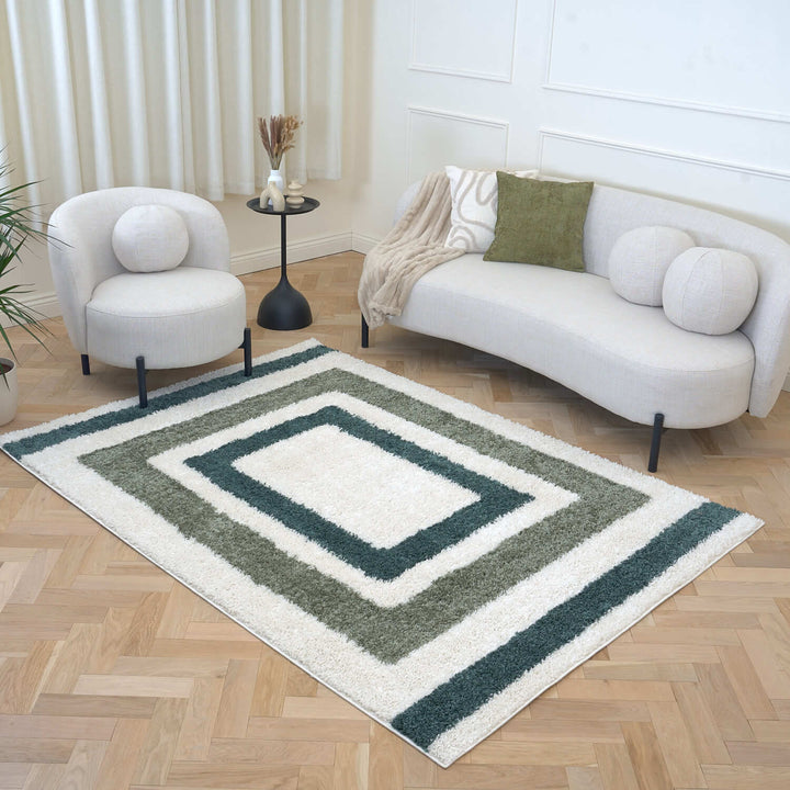 Moodi Shaggy Green Rug, Bordered design, underfloor heating | THE RUGS