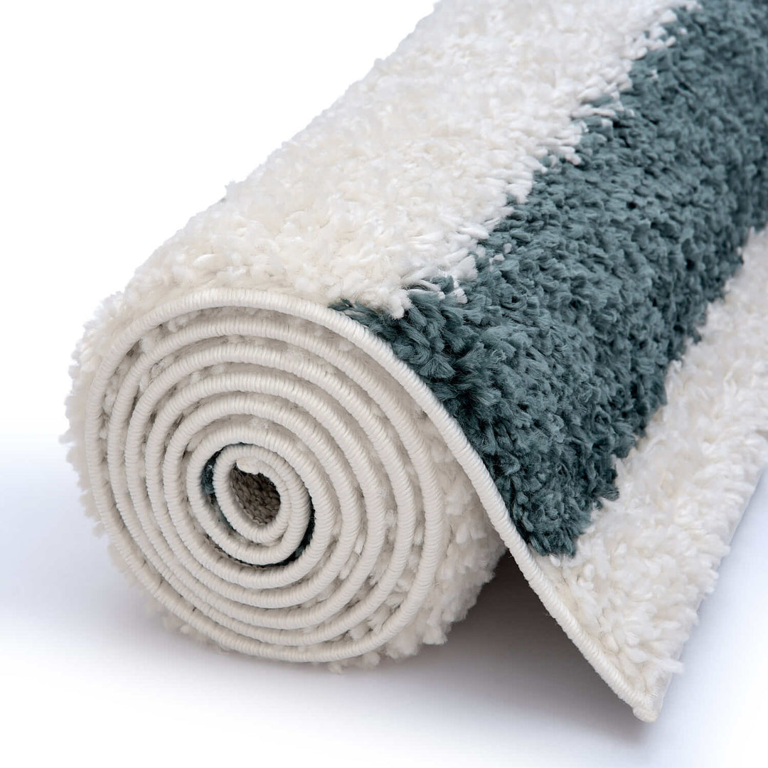 Moodi Shaggy Green Rug, Bordered design, underfloor heating | THE RUGS