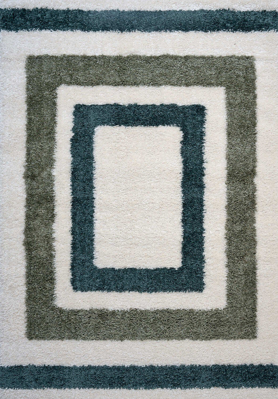 Moodi Shaggy Green Rug, Bordered design, underfloor heating | THE RUGS