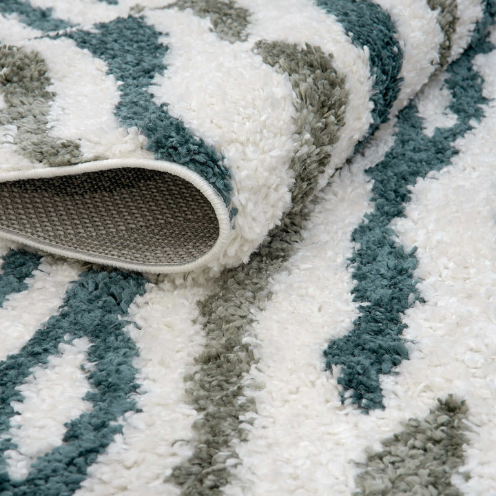 Moodi Shaggy Green Rug, abstract design, 30 mm plush pile | THE RUGS