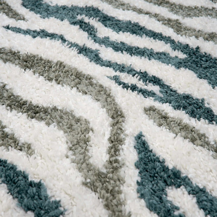 Moodi Shaggy Green Rug, abstract design, 30 mm plush pile | THE RUGS