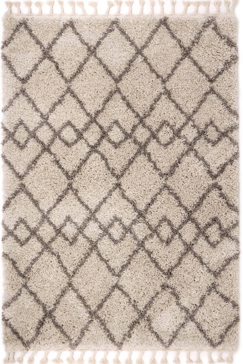 Moroccan style rug in beige with grey diamond pattern, featuring tassels, perfect for adding charm to any home.