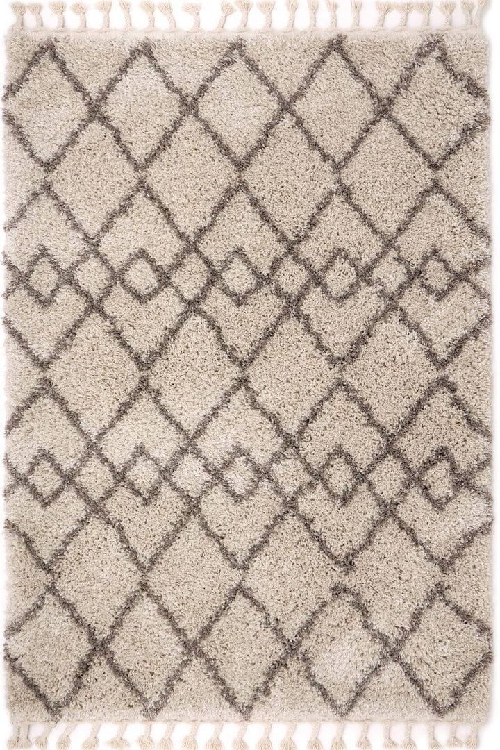 Moroccan style rug in beige with grey diamond pattern, featuring tassels, perfect for adding charm to any home.