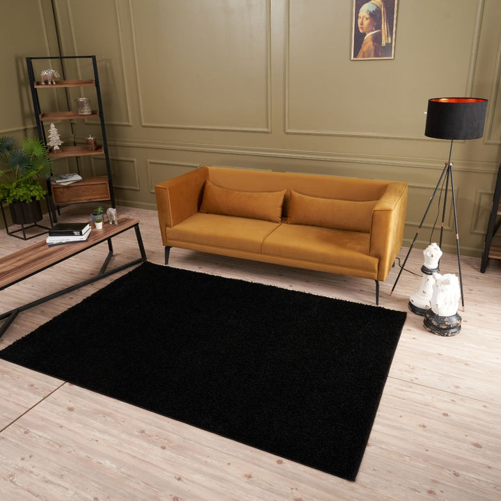 Black shaggy Rug Plain design thick pile, high quality, soft & durable.