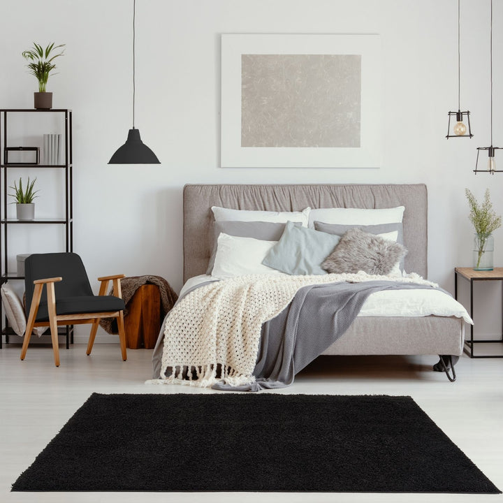 Black shaggy Rug Plain design thick pile, high quality, soft & durable.